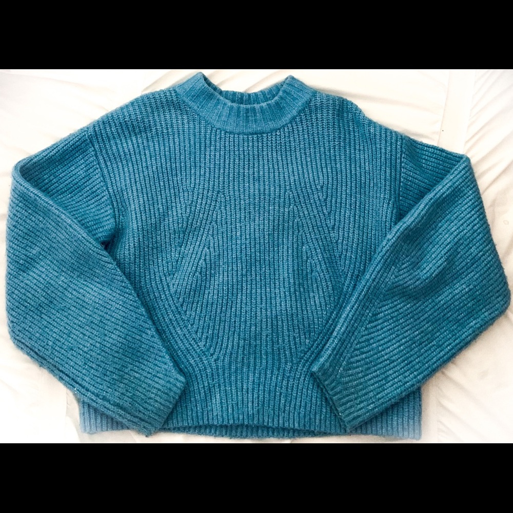 Knitted blue sweater